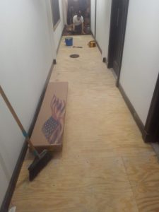 man doing floor installation